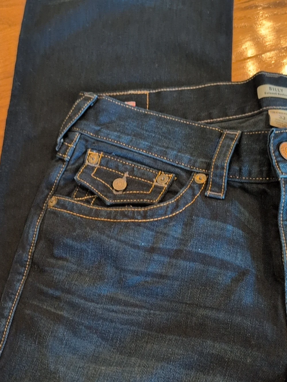 True Religion men's Dark Blue Bootcut Jeans with Signature Pocket Flap